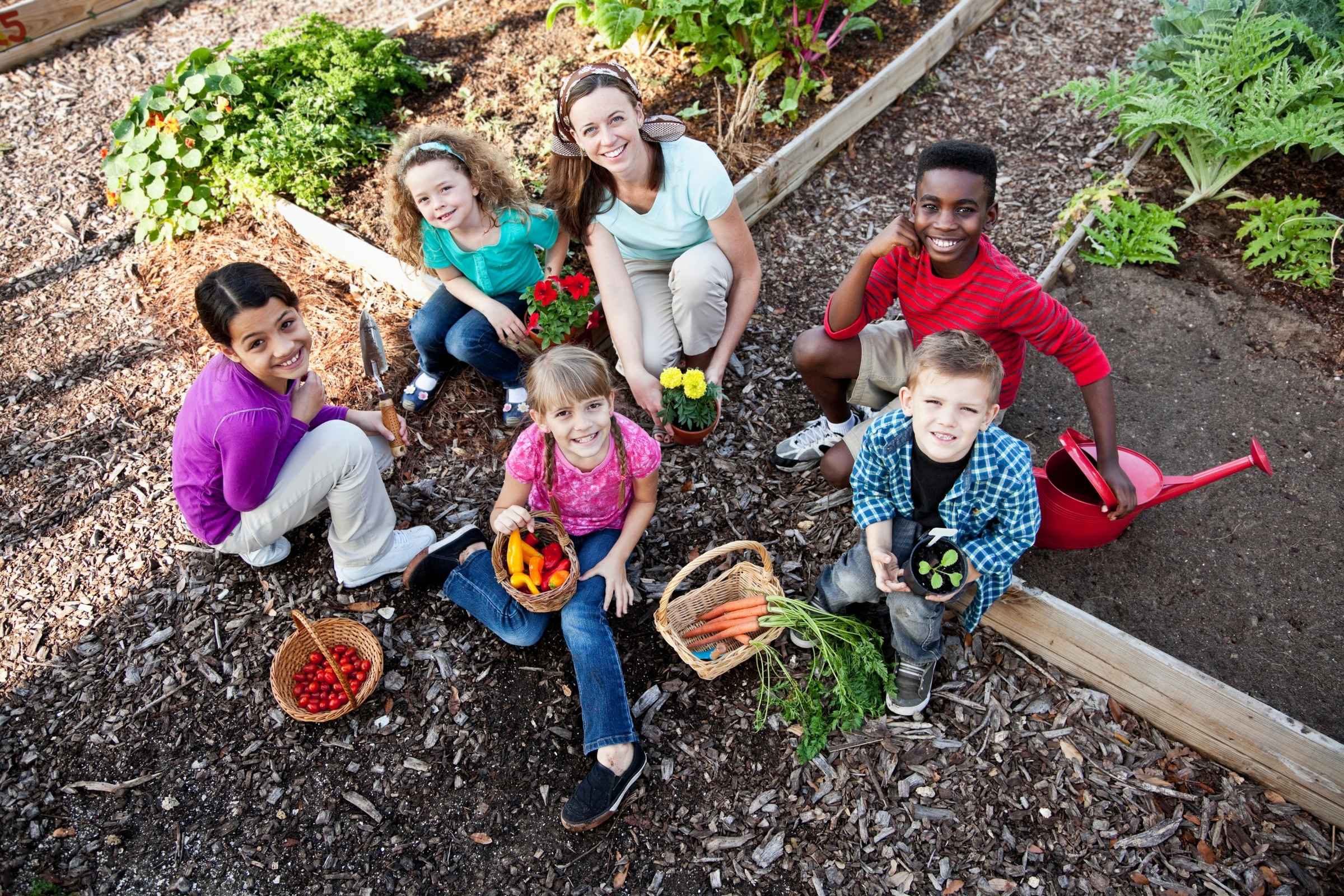 children gardening together